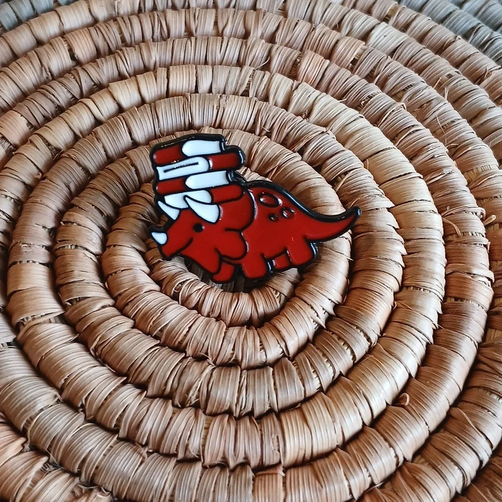 NEW Red Bookworm Triceratops Enamel Pin